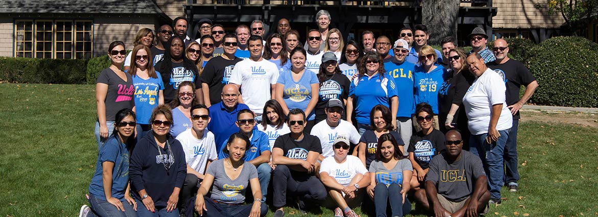 Group photo on the lawn in front of the lodge.